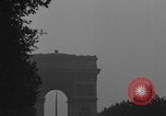 Image of Piper Cub flying Avenue des Champs Elysees Paris France, 1944, second 38 stock footage video 65675079487