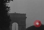 Image of Piper Cub flying Avenue des Champs Elysees Paris France, 1944, second 39 stock footage video 65675079487