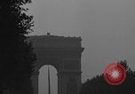Image of Piper Cub flying Avenue des Champs Elysees Paris France, 1944, second 40 stock footage video 65675079487