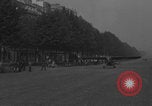 Image of Piper Cub flying Avenue des Champs Elysees Paris France, 1944, second 42 stock footage video 65675079487