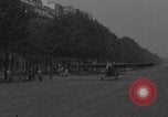 Image of Piper Cub flying Avenue des Champs Elysees Paris France, 1944, second 43 stock footage video 65675079487