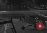 Image of Piper Cub flying Avenue des Champs Elysees Paris France, 1944, second 51 stock footage video 65675079487