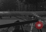 Image of Piper Cub flying Avenue des Champs Elysees Paris France, 1944, second 52 stock footage video 65675079487