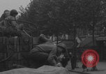 Image of US soldier kisses women girls Paris France, 1944, second 4 stock footage video 65675079491