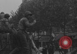 Image of US soldier kisses women girls Paris France, 1944, second 7 stock footage video 65675079491