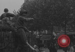 Image of US soldier kisses women girls Paris France, 1944, second 8 stock footage video 65675079491