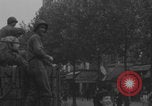 Image of US soldier kisses women girls Paris France, 1944, second 9 stock footage video 65675079491