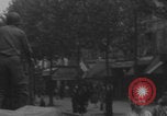 Image of US soldier kisses women girls Paris France, 1944, second 10 stock footage video 65675079491