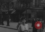 Image of US soldier kisses women girls Paris France, 1944, second 11 stock footage video 65675079491