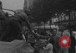 Image of US soldier kisses women girls Paris France, 1944, second 17 stock footage video 65675079491