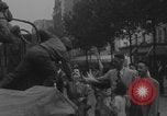 Image of US soldier kisses women girls Paris France, 1944, second 18 stock footage video 65675079491