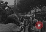 Image of US soldier kisses women girls Paris France, 1944, second 19 stock footage video 65675079491