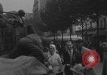 Image of US soldier kisses women girls Paris France, 1944, second 20 stock footage video 65675079491