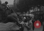 Image of US soldier kisses women girls Paris France, 1944, second 21 stock footage video 65675079491