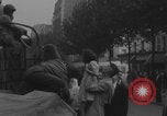 Image of US soldier kisses women girls Paris France, 1944, second 22 stock footage video 65675079491