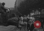 Image of US soldier kisses women girls Paris France, 1944, second 23 stock footage video 65675079491