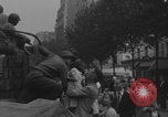 Image of US soldier kisses women girls Paris France, 1944, second 25 stock footage video 65675079491
