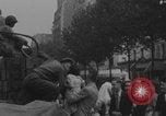 Image of US soldier kisses women girls Paris France, 1944, second 26 stock footage video 65675079491