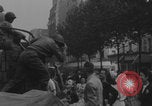 Image of US soldier kisses women girls Paris France, 1944, second 27 stock footage video 65675079491