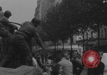 Image of US soldier kisses women girls Paris France, 1944, second 28 stock footage video 65675079491