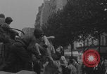 Image of US soldier kisses women girls Paris France, 1944, second 31 stock footage video 65675079491