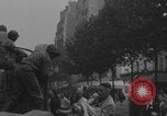 Image of US soldier kisses women girls Paris France, 1944, second 32 stock footage video 65675079491