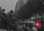 Image of US soldier kisses women girls Paris France, 1944, second 33 stock footage video 65675079491