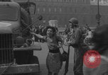 Image of US soldier kisses women girls Paris France, 1944, second 34 stock footage video 65675079491