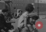 Image of US soldier kisses women girls Paris France, 1944, second 36 stock footage video 65675079491