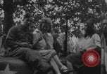 Image of French women and soldiers socialize Paris France, 1944, second 30 stock footage video 65675079494