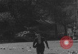 Image of FFI fighters running away from tank Paris France, 1944, second 3 stock footage video 65675079505