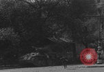 Image of FFI fighters running away from tank Paris France, 1944, second 9 stock footage video 65675079505