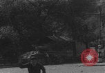 Image of FFI fighters running away from tank Paris France, 1944, second 12 stock footage video 65675079505