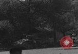 Image of FFI fighters running away from tank Paris France, 1944, second 13 stock footage video 65675079505