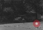 Image of FFI fighters running away from tank Paris France, 1944, second 16 stock footage video 65675079505
