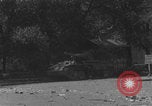 Image of FFI fighters running away from tank Paris France, 1944, second 21 stock footage video 65675079505