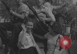 Image of French civilians cheering during parade Paris France, 1944, second 50 stock footage video 65675079508