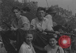 Image of French civilians cheering during parade Paris France, 1944, second 52 stock footage video 65675079508