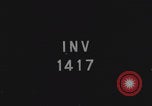 Image of FFI fighters playing with Hitler portrait Paris France, 1944, second 1 stock footage video 65675079512