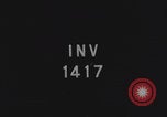 Image of FFI fighters playing with Hitler portrait Paris France, 1944, second 3 stock footage video 65675079512