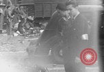 Image of FFI fighters playing with Hitler portrait Paris France, 1944, second 5 stock footage video 65675079512