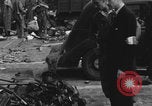 Image of FFI fighters playing with Hitler portrait Paris France, 1944, second 6 stock footage video 65675079512