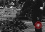 Image of FFI fighters playing with Hitler portrait Paris France, 1944, second 7 stock footage video 65675079512