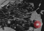 Image of FFI fighters playing with Hitler portrait Paris France, 1944, second 15 stock footage video 65675079512
