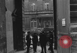 Image of FFI fighters playing with Hitler portrait Paris France, 1944, second 20 stock footage video 65675079512