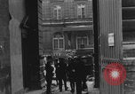 Image of FFI fighters playing with Hitler portrait Paris France, 1944, second 21 stock footage video 65675079512