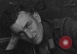 Image of FFI fighters playing with Hitler portrait Paris France, 1944, second 28 stock footage video 65675079512
