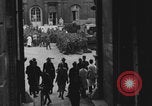 Image of FFI fighters playing with Hitler portrait Paris France, 1944, second 30 stock footage video 65675079512