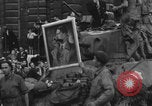 Image of FFI fighters playing with Hitler portrait Paris France, 1944, second 40 stock footage video 65675079512