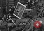 Image of FFI fighters playing with Hitler portrait Paris France, 1944, second 41 stock footage video 65675079512